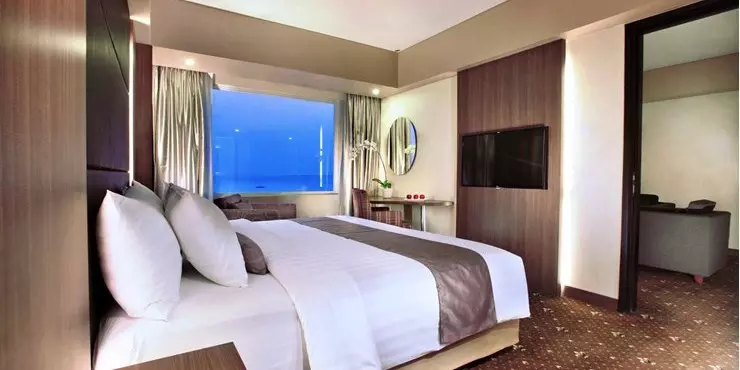 Spacious suite with ocean view adjoined living in a modern hotel in kupang