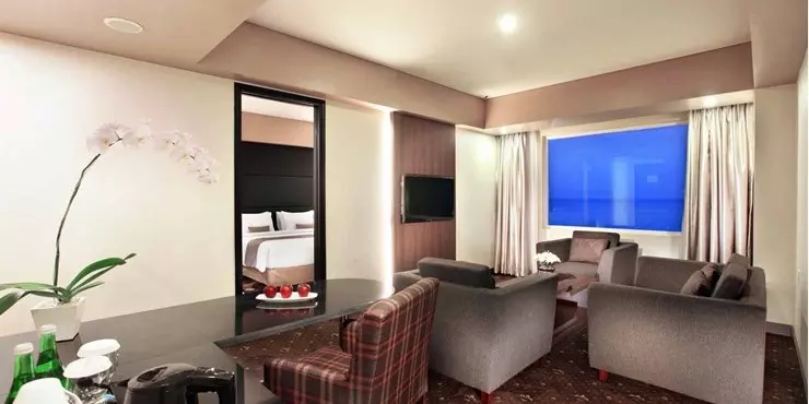 Spacious suite with ocean view adjoined living in a modern hotel in kupang