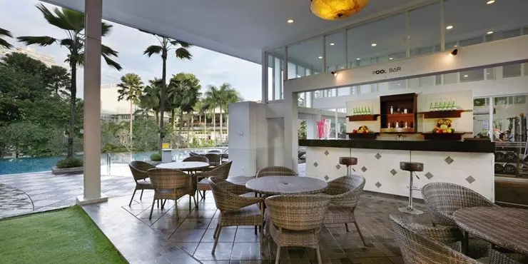 you can enjoy relaxing at the pool bar while sipping on a well-deserved drink.