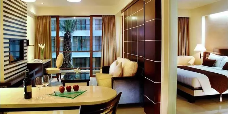 Luxury suite room with living and dining room and equipped pantry in Kuta bali