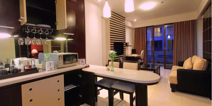 Luxury suite room with living and dining room and equipped pantry in Kuta bali