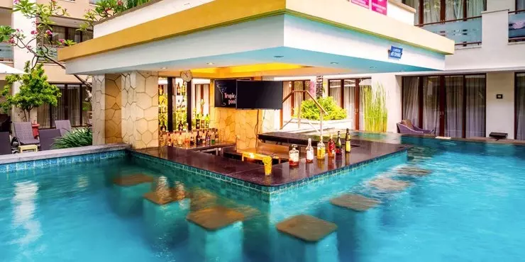 refreshing pool bar to chill out and relax in swimming pool kuta bali