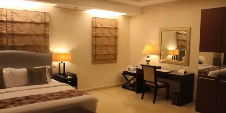 Modern room for VIP guest with classic design and adjoined living area in manado