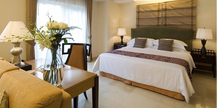 Modern room with classic design and adjoined living area in manado